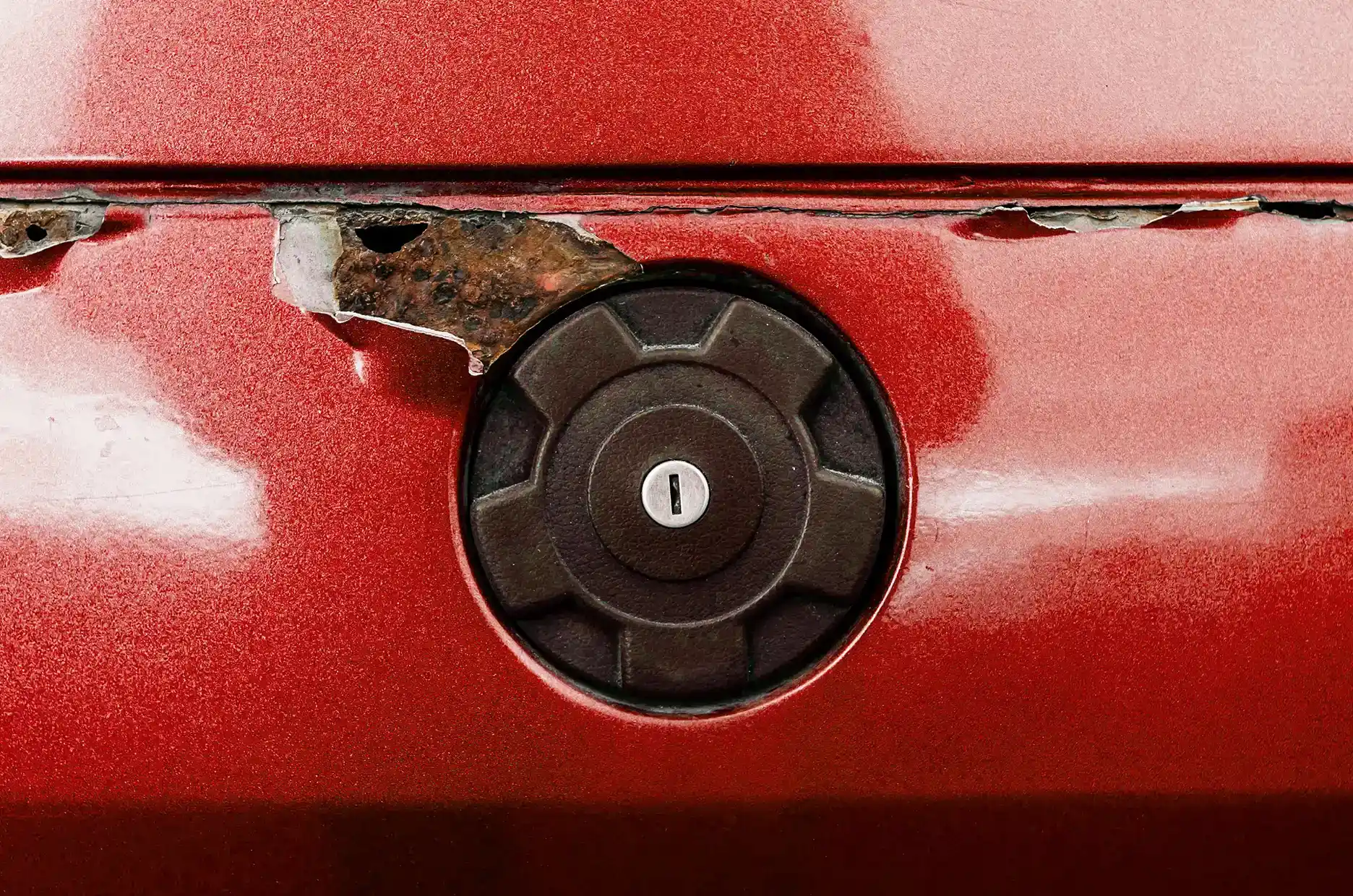 Peeling clear coat on cheap car paint repair needing redo


            