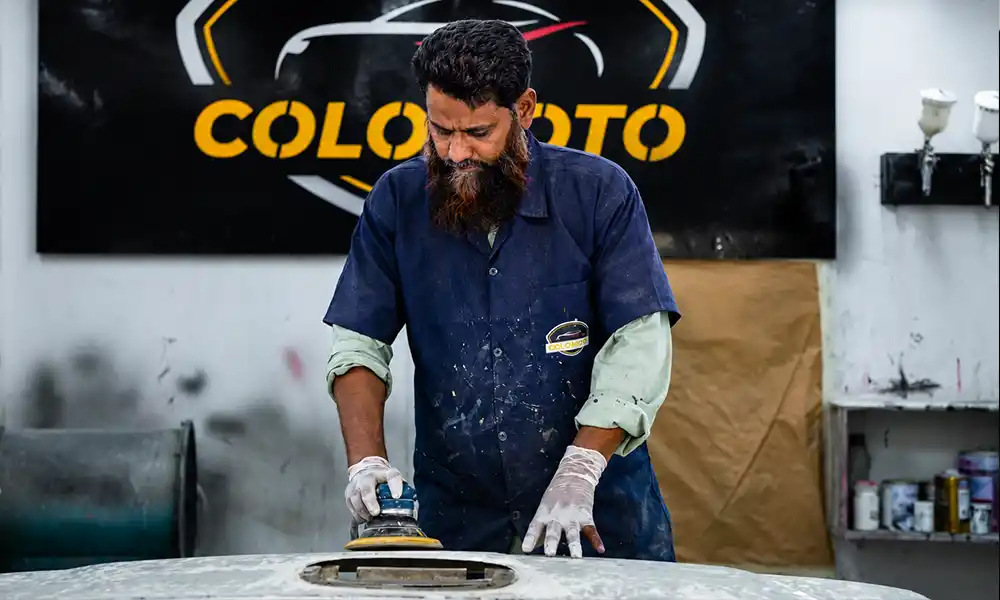 Wet sanding and machine polishing on Day 8 at Colomoto